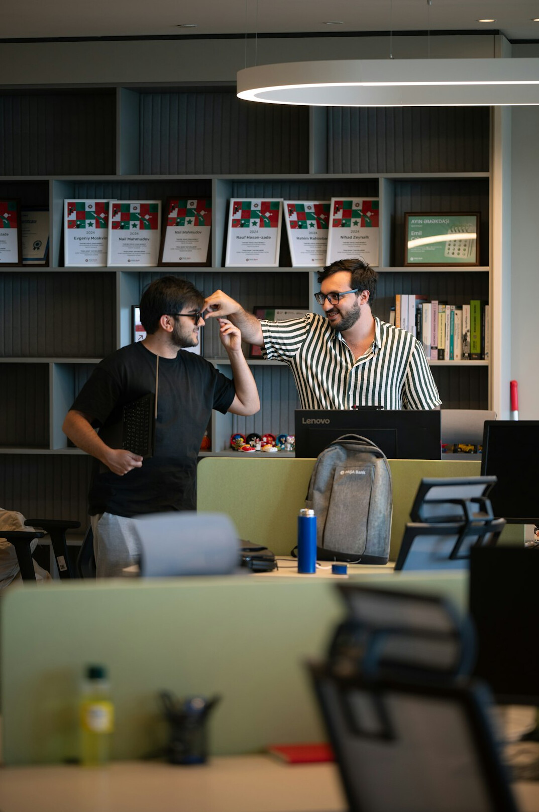 team doing morning exercises in office