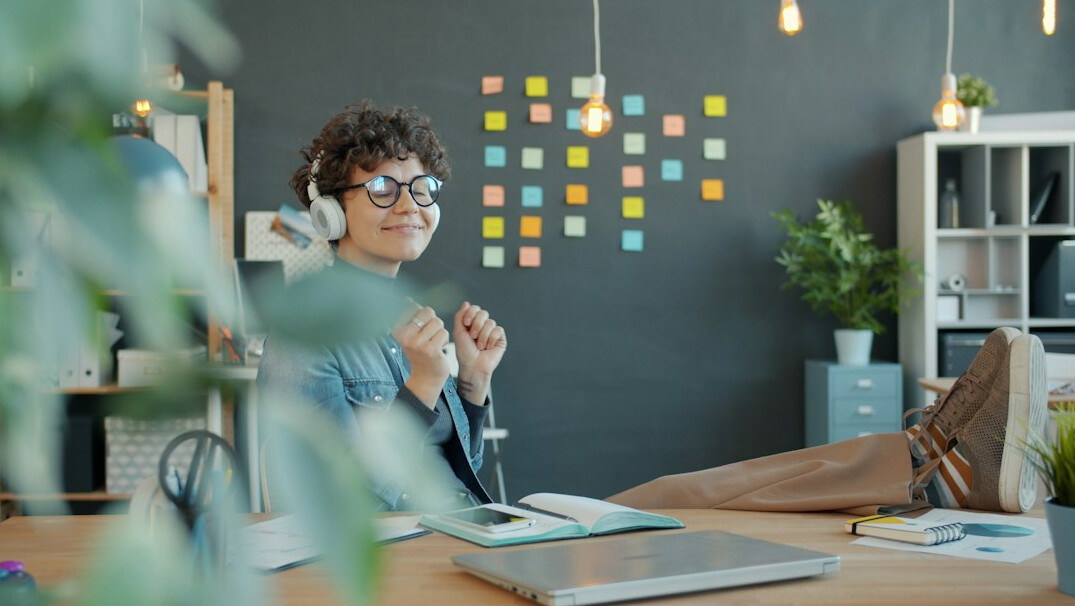 person meditating at desk